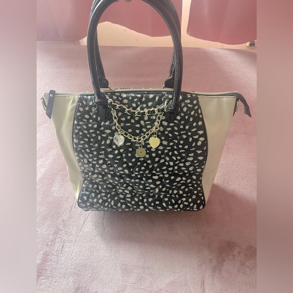Betsey Johnson large crossbody tote in a cheetah print.